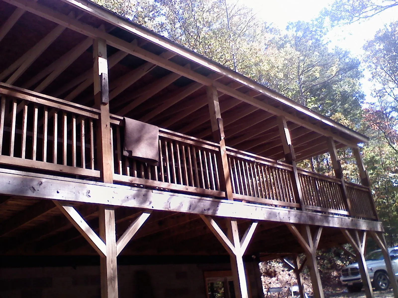 Timber framing under a new elevated porch and deck — Roof Leak Repair in Slade by Roofing Brothers